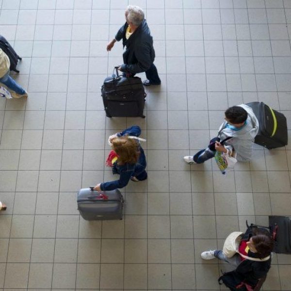 Reizigers corona angst schiphol nieuws virus doets reizen