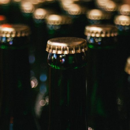 Bierflessen bieromzet supermarkthouder tevreden