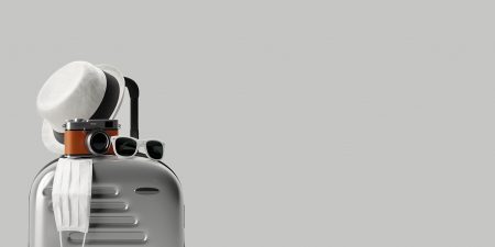 Reizen vakantie koffer mondkapje corona