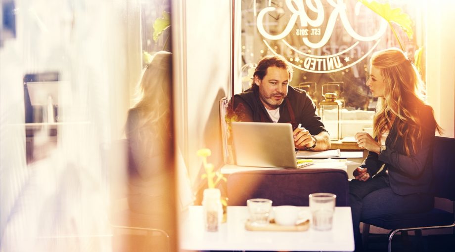 Ppt man and girl behind labtop in lunchroom business with glow 1