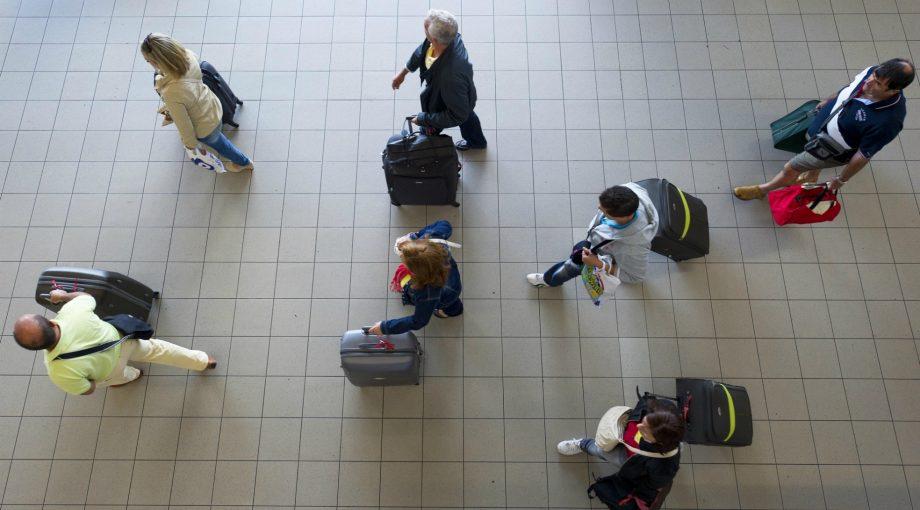 Reizigers corona angst schiphol nieuws virus doets reizen