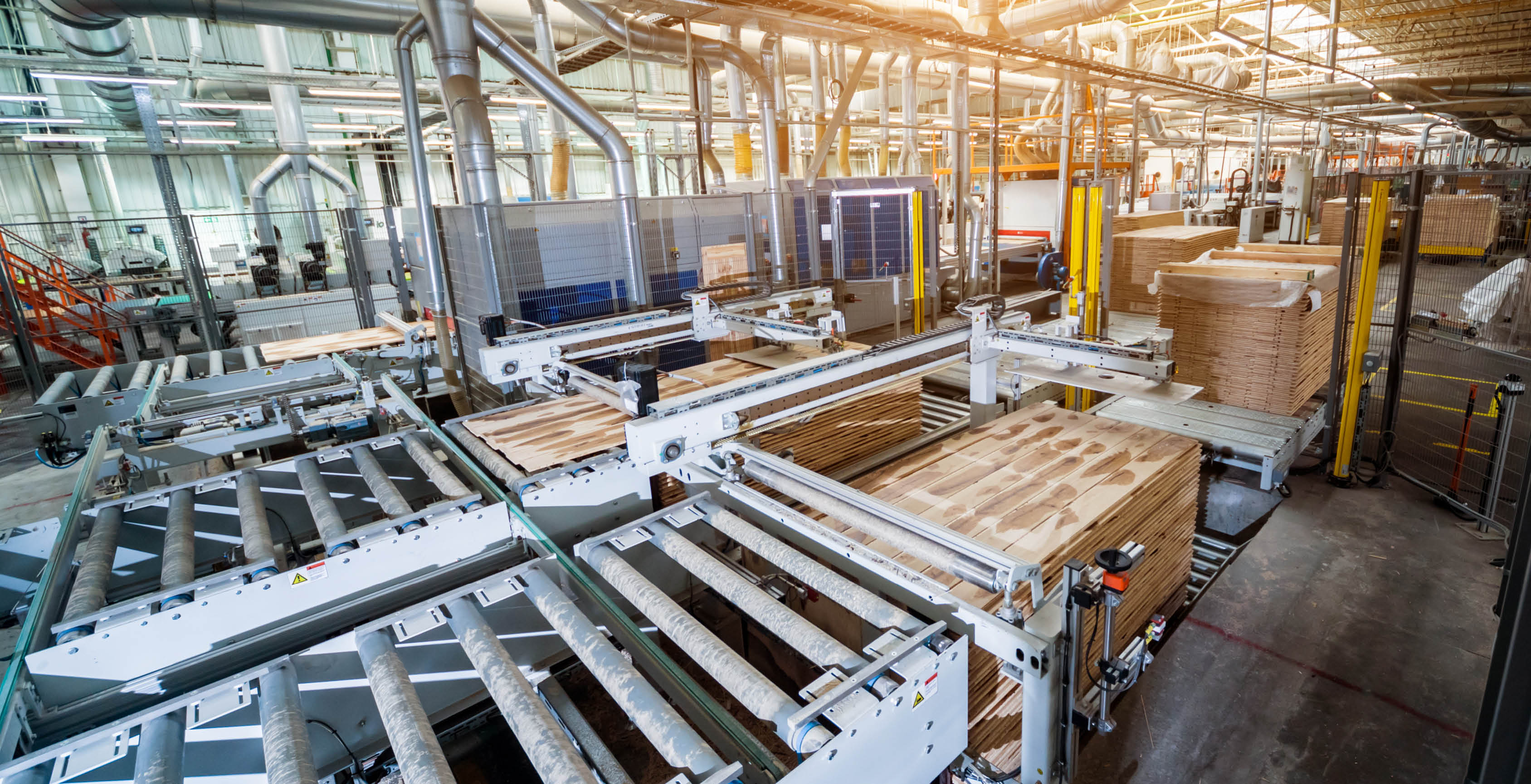 Production line of the wooden floor factory  CNC automatic woodworking machine  Industrial background