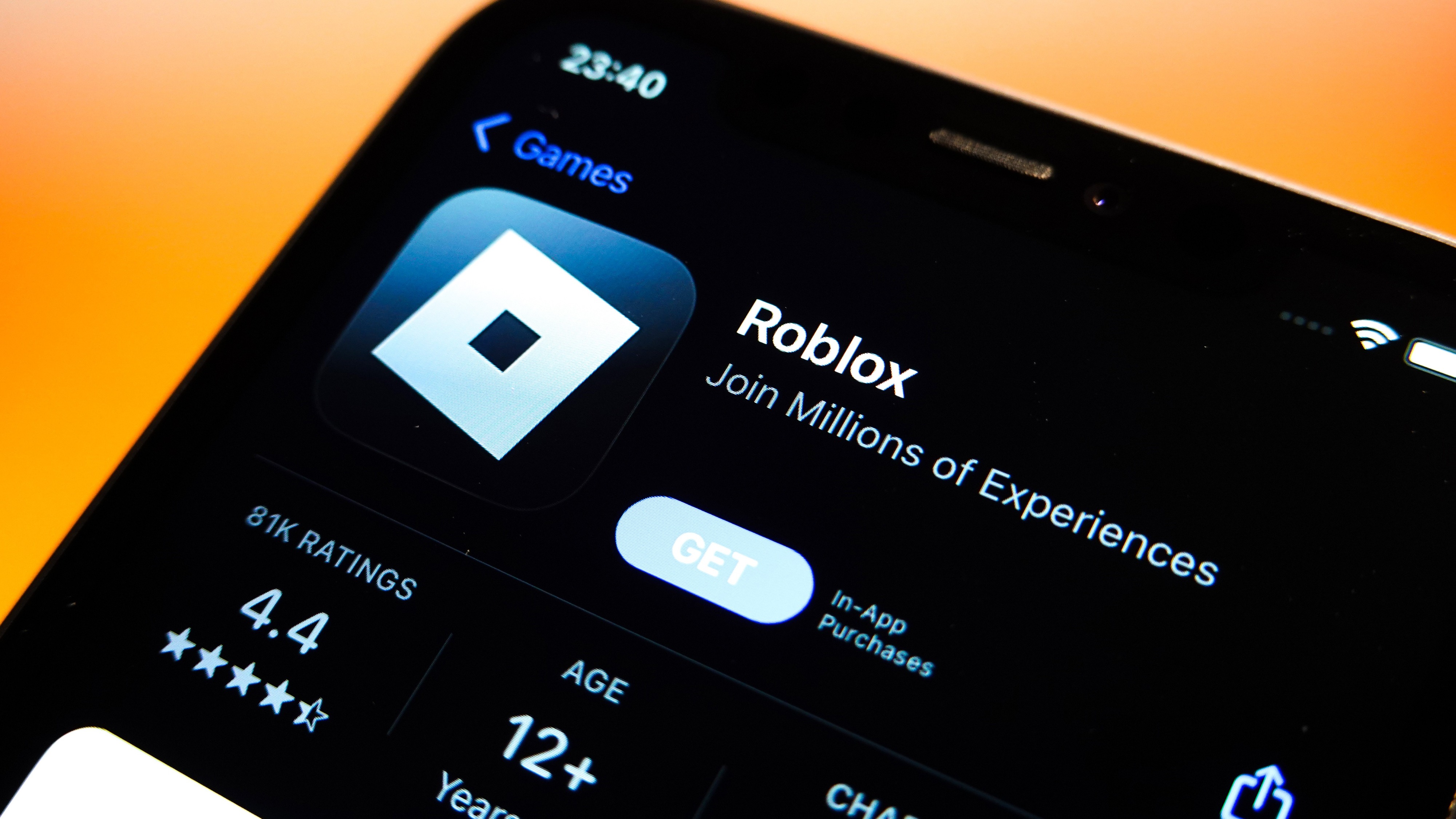 The Roblox logo is displayed in the Apple App Store on an iPhone.