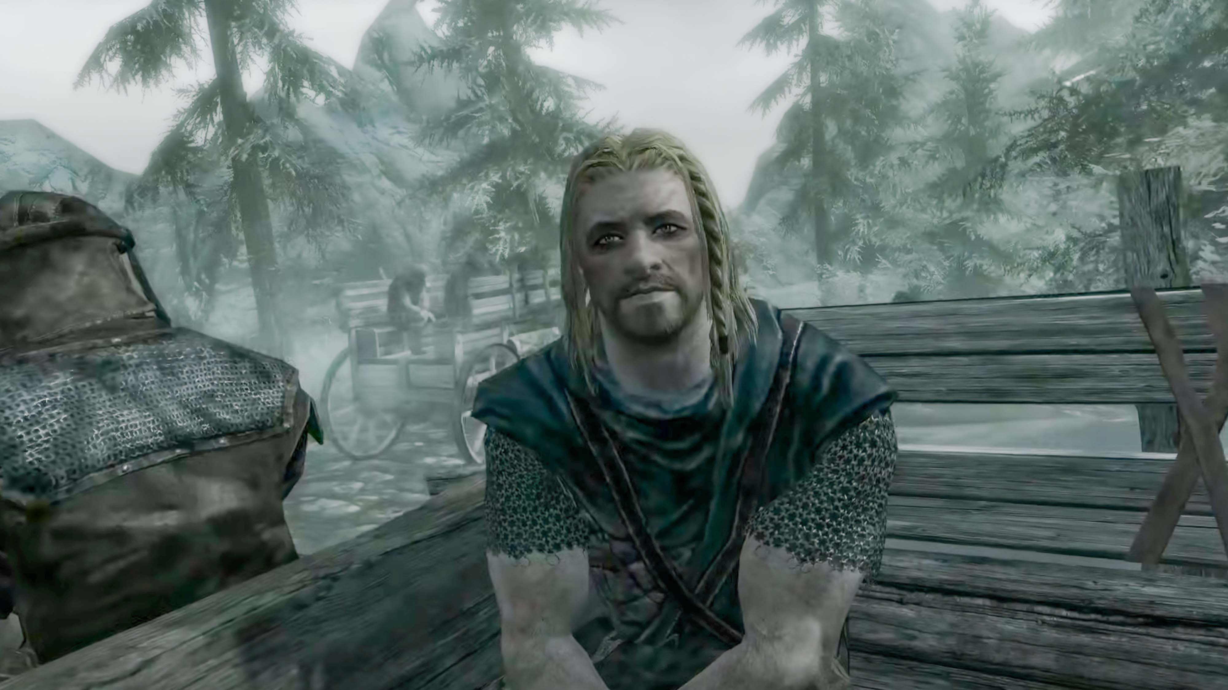 Кадр из The Elder Scrolls V: Skyrim: пленник в повозке в начале игры.
