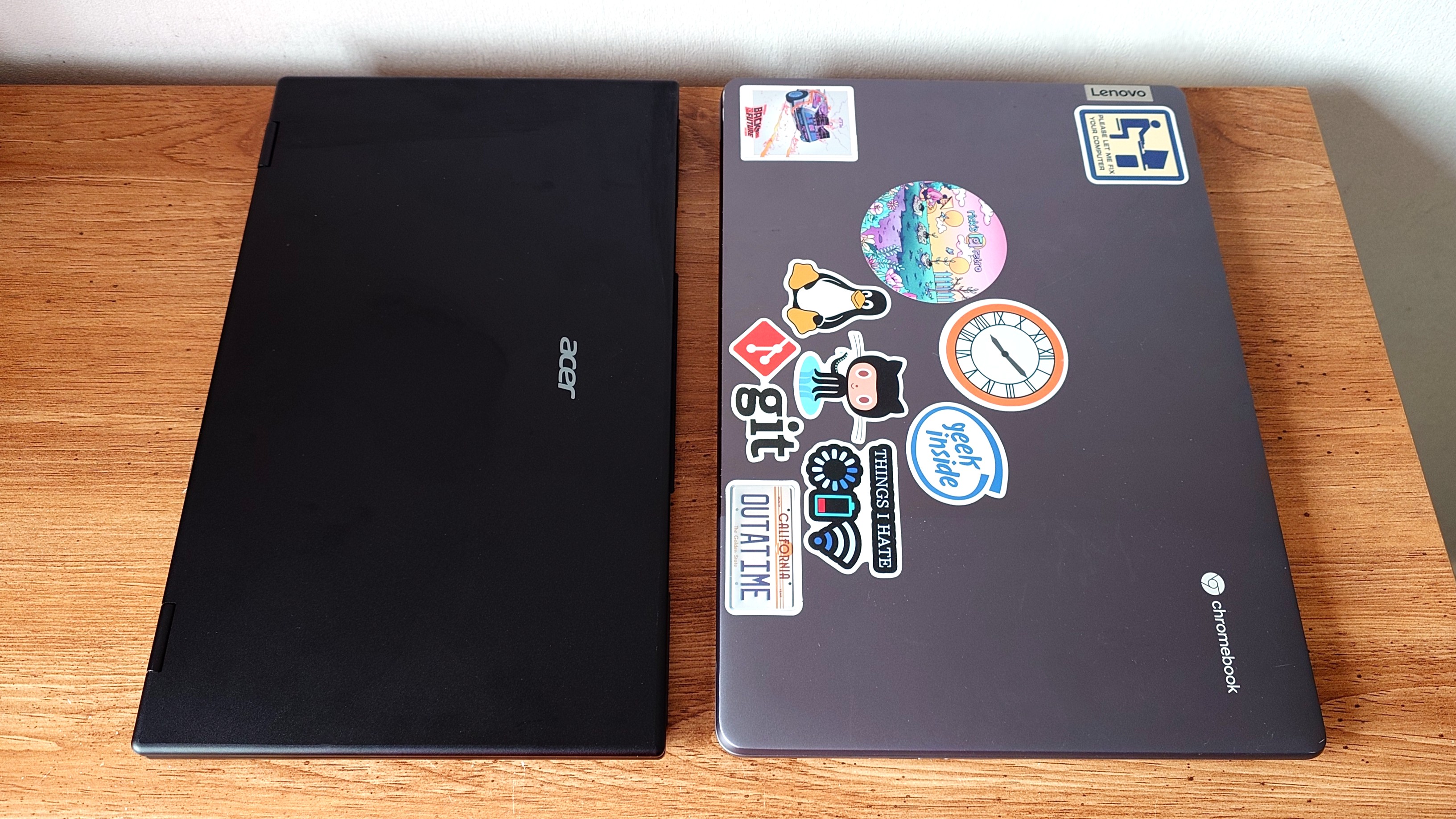 Comparing the size of Acer's dual-screen portable monitor to a 16-inch laptop.