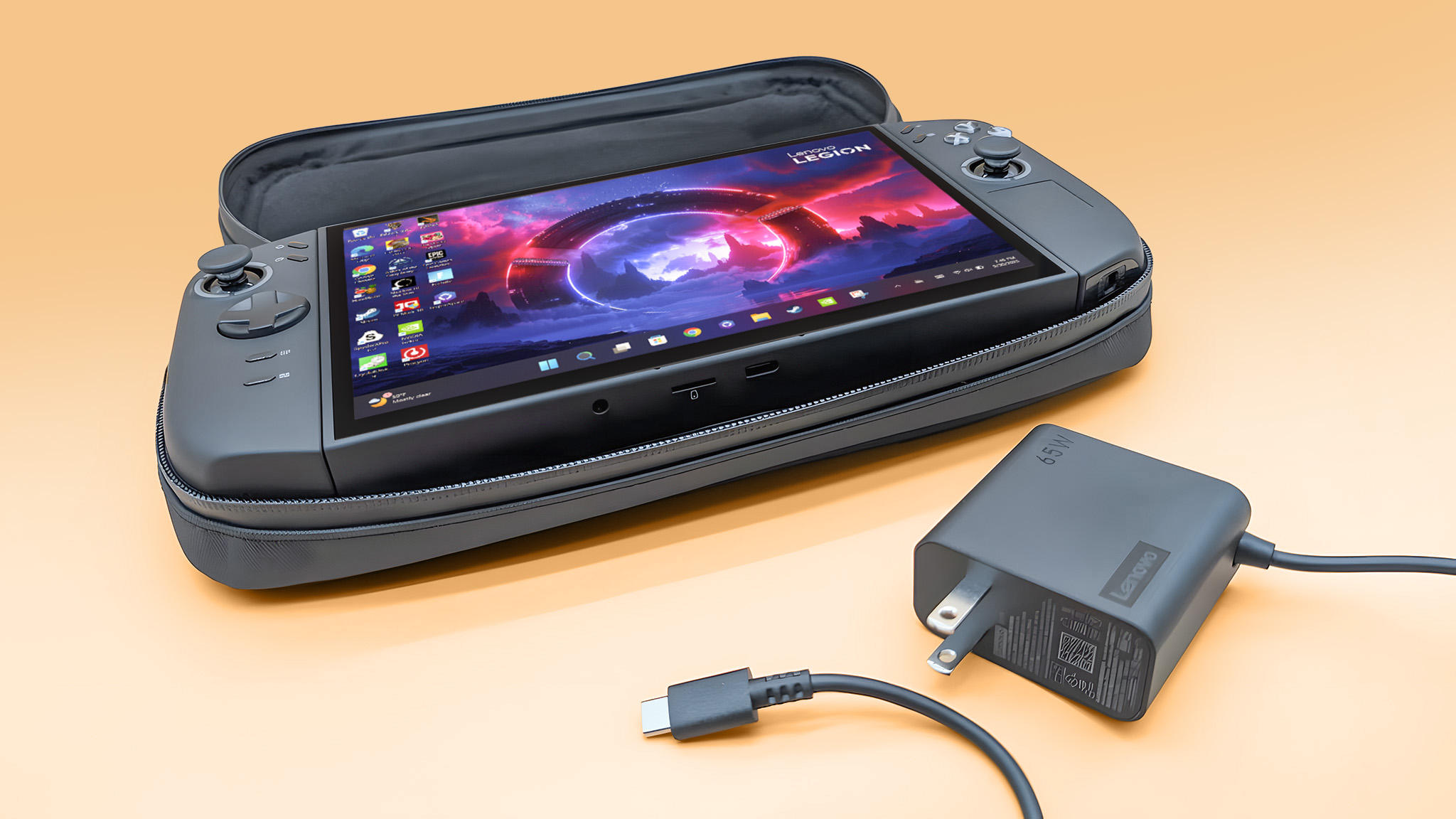 Lenovo Legion Go 2 в чехле с адаптером питания 65 Вт рядом с ним.