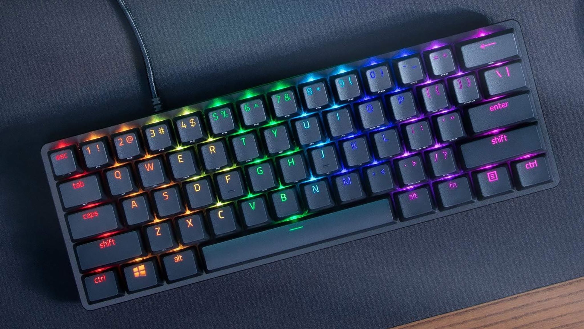 Razer Huntsman Mini keyboard on a desk.