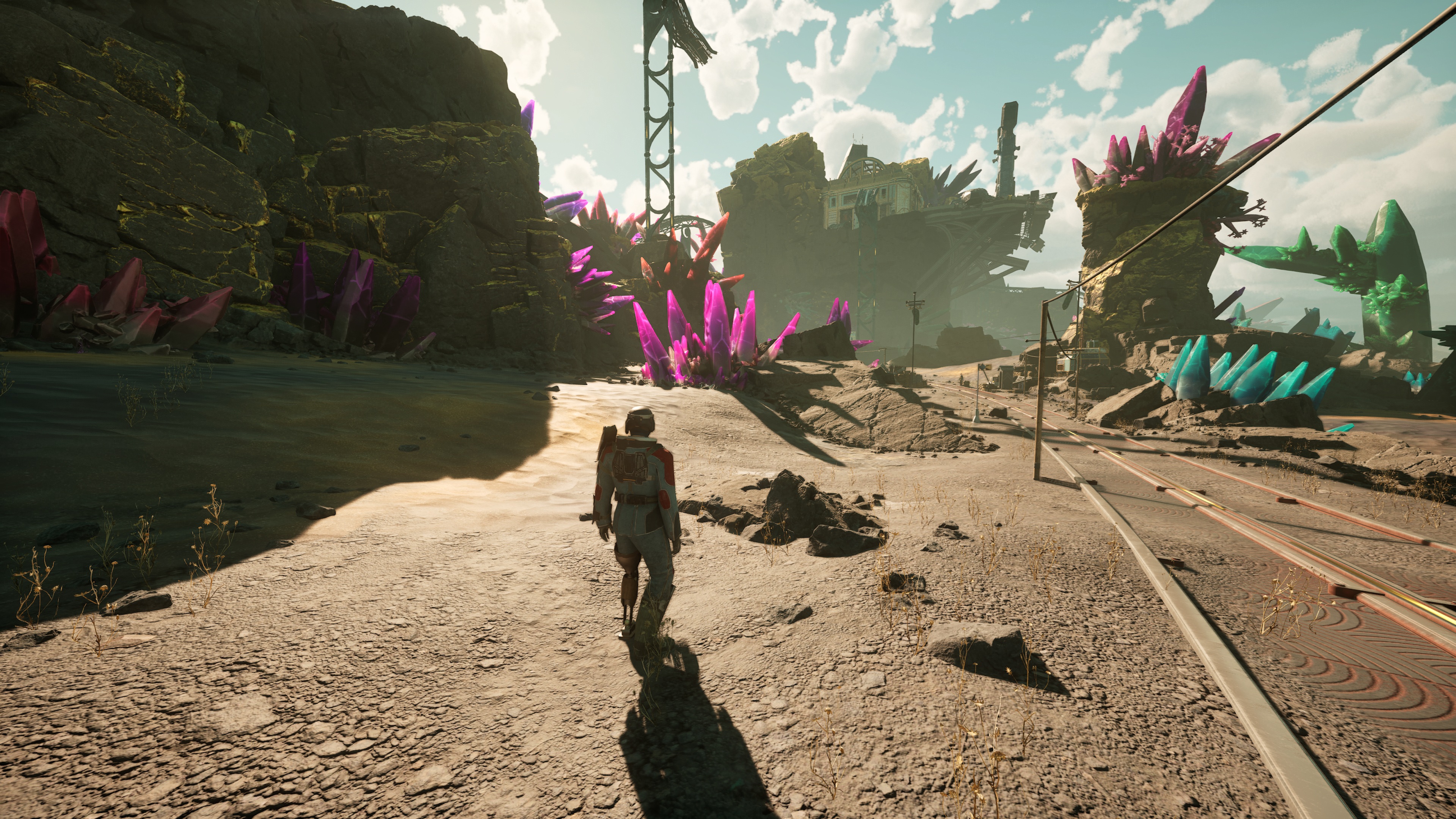 Purple and cyan crystals on a planet in The Outer Worlds 2