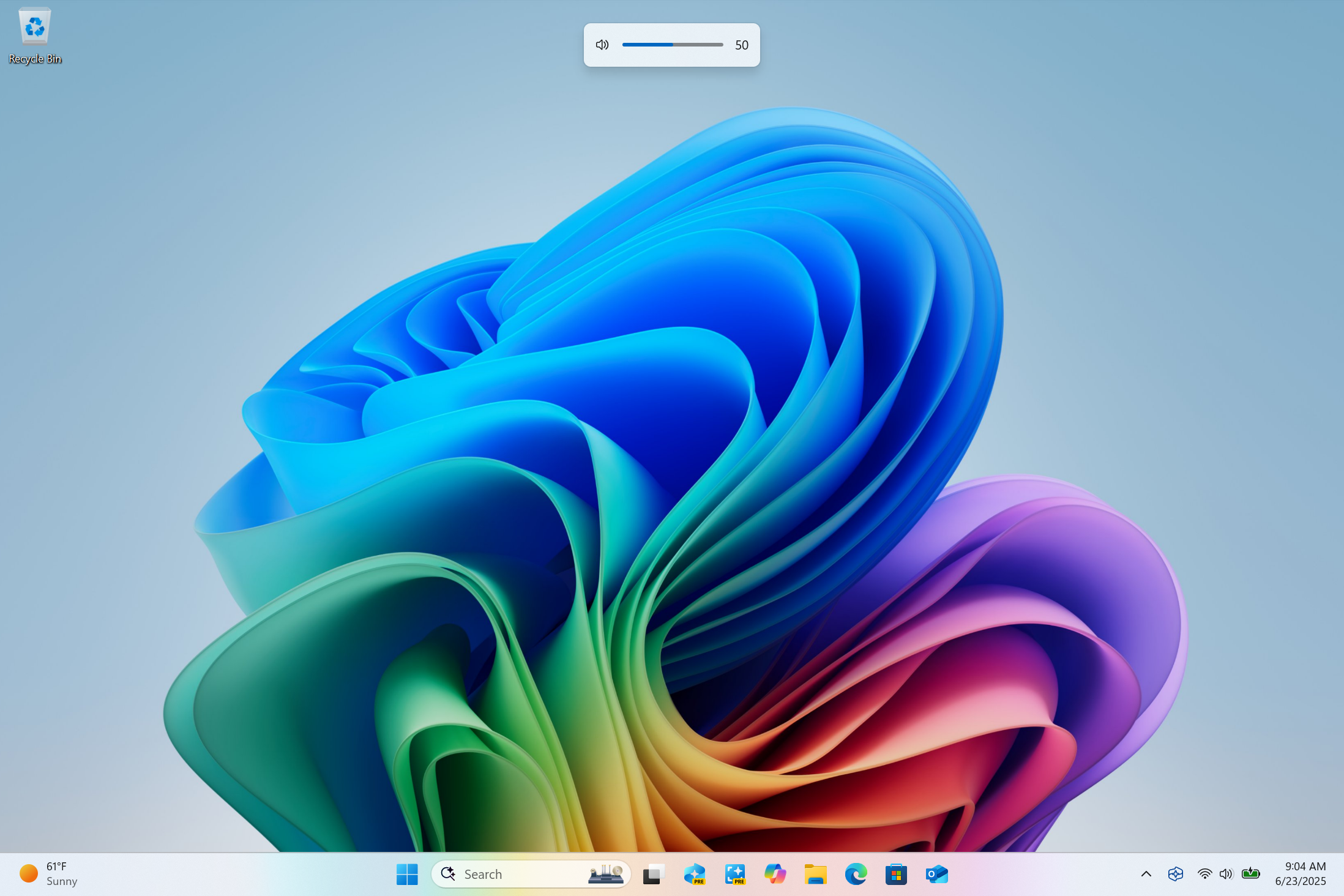 Hardware indicator for volume shown at the top center.