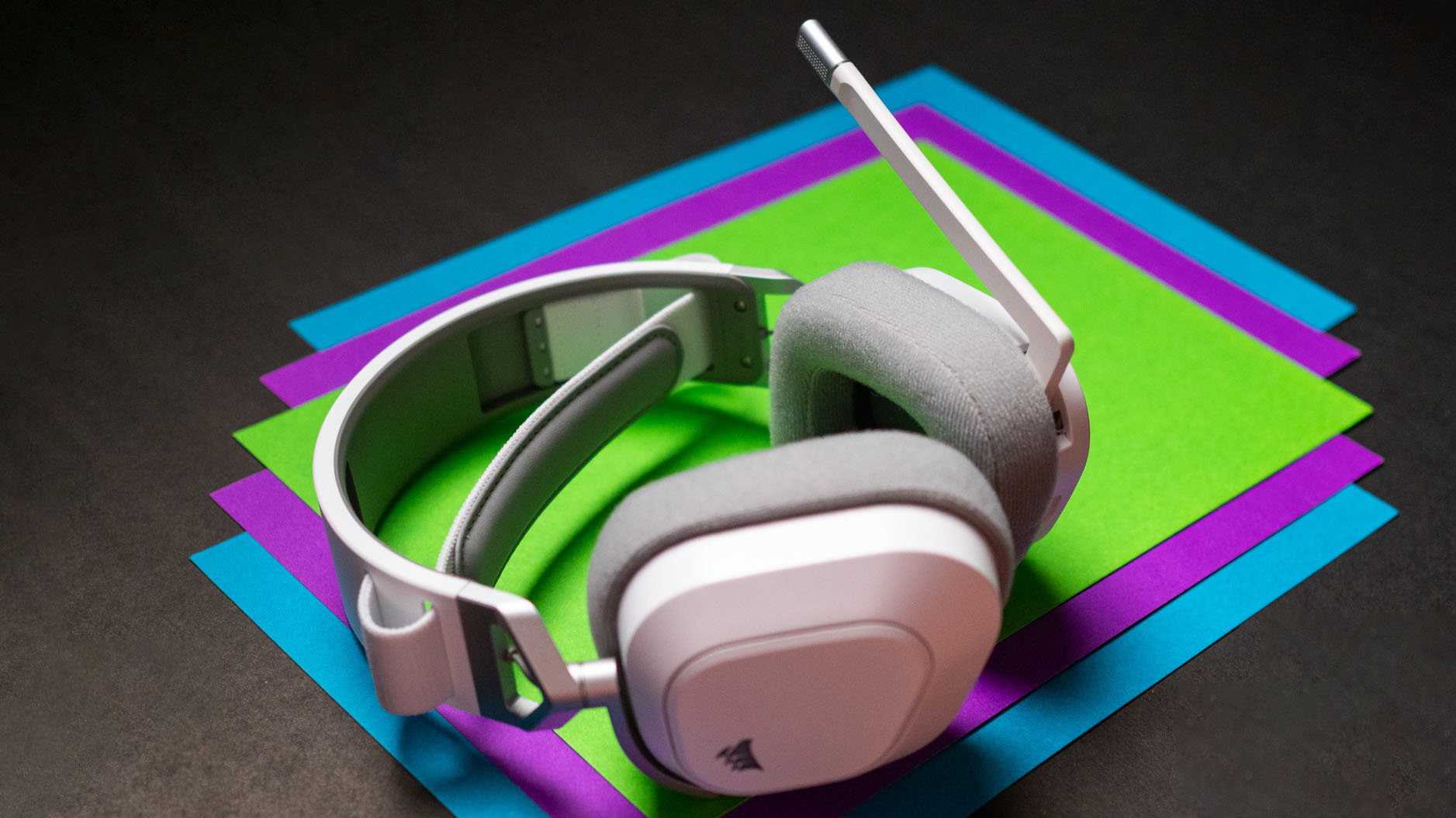 Corsair HS80 Max side view against colorful background