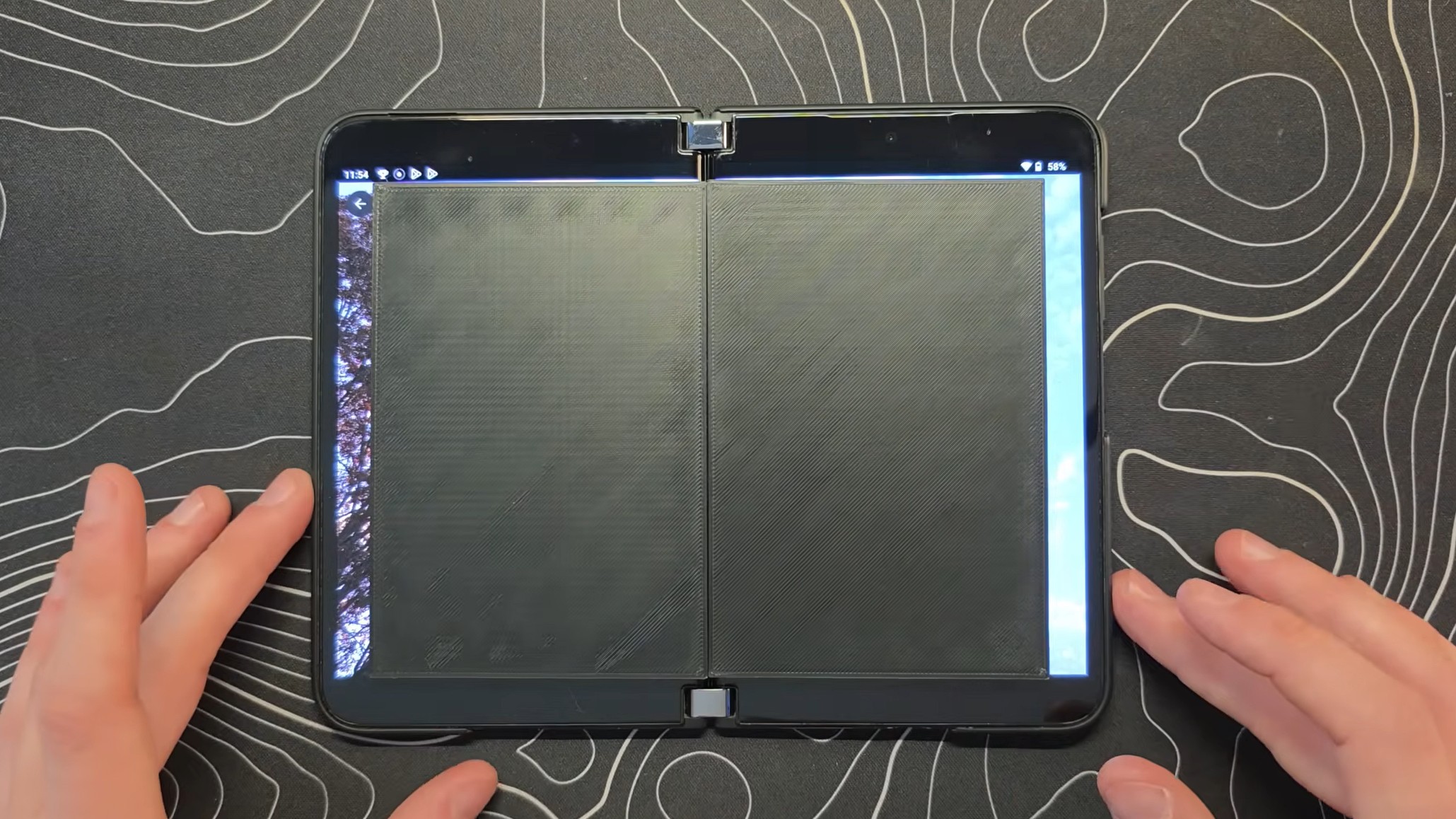 Comparison of iPhone Fold inner display with Surface Duo 2