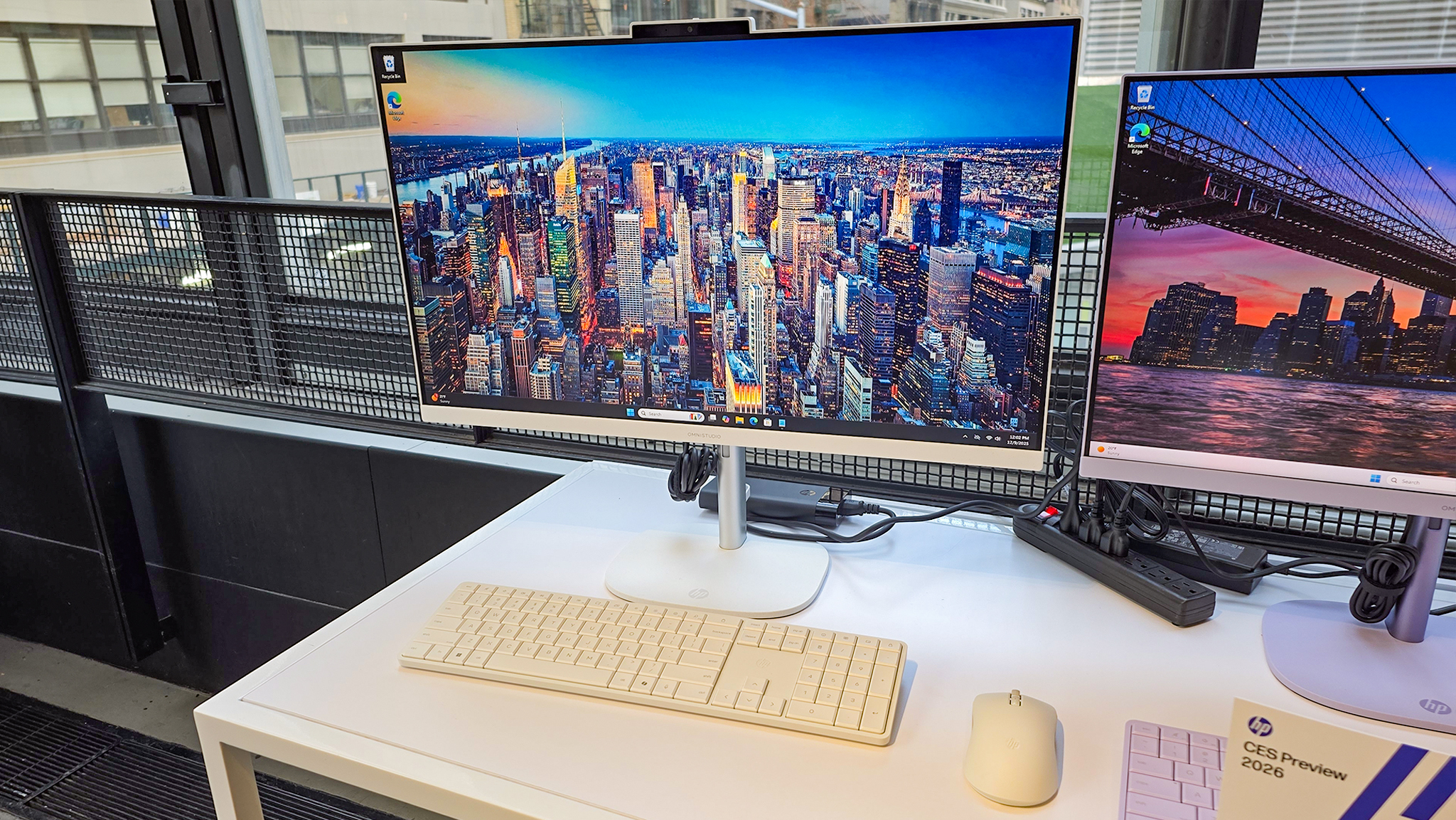 HP OmniStudio X 27-inch All-in-One Desktop on a desk.