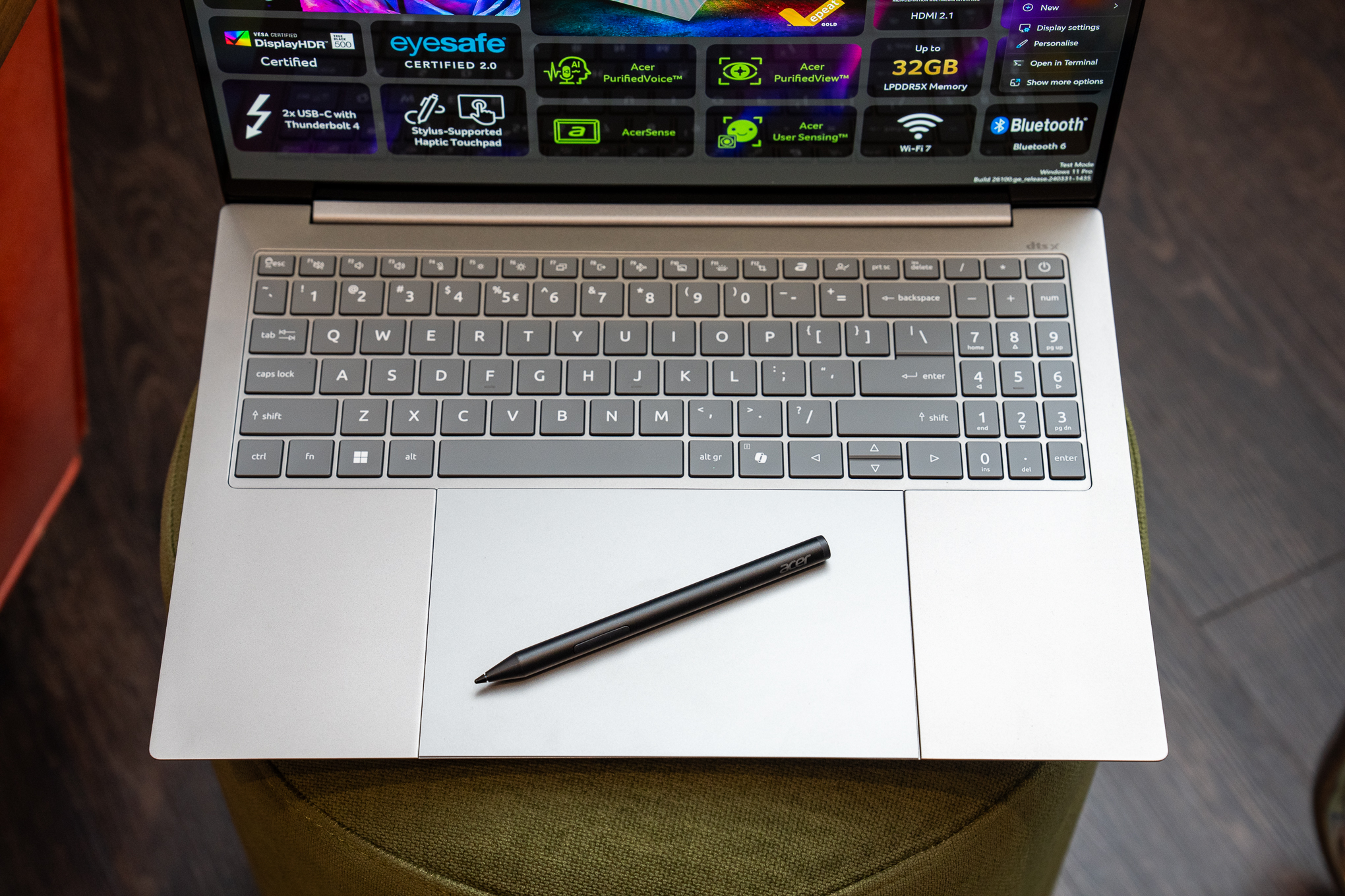 Acer Swift 16 AI laptop with stylus.