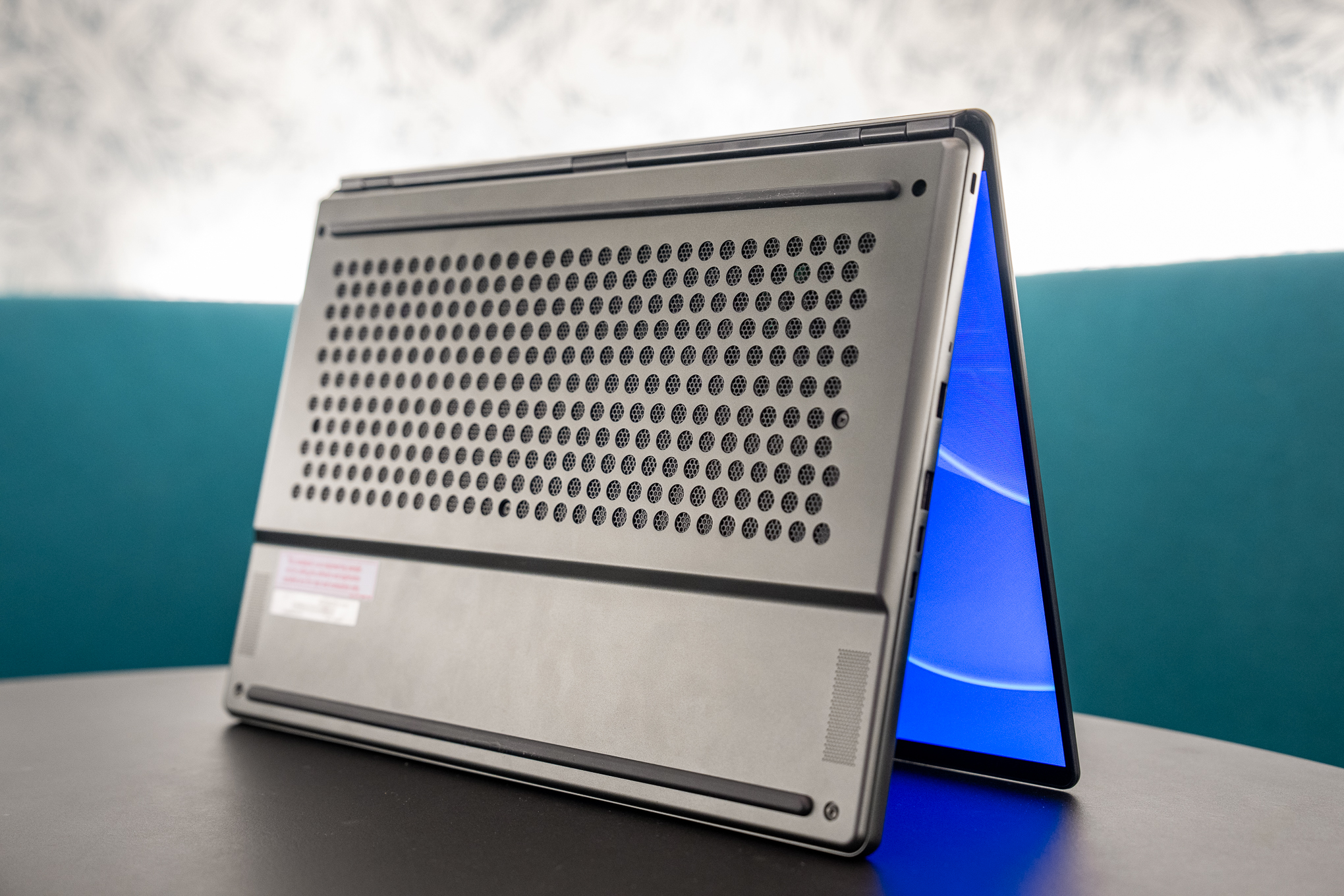 MSI Stealth 16 AI Plus laptop, showing the side profile.