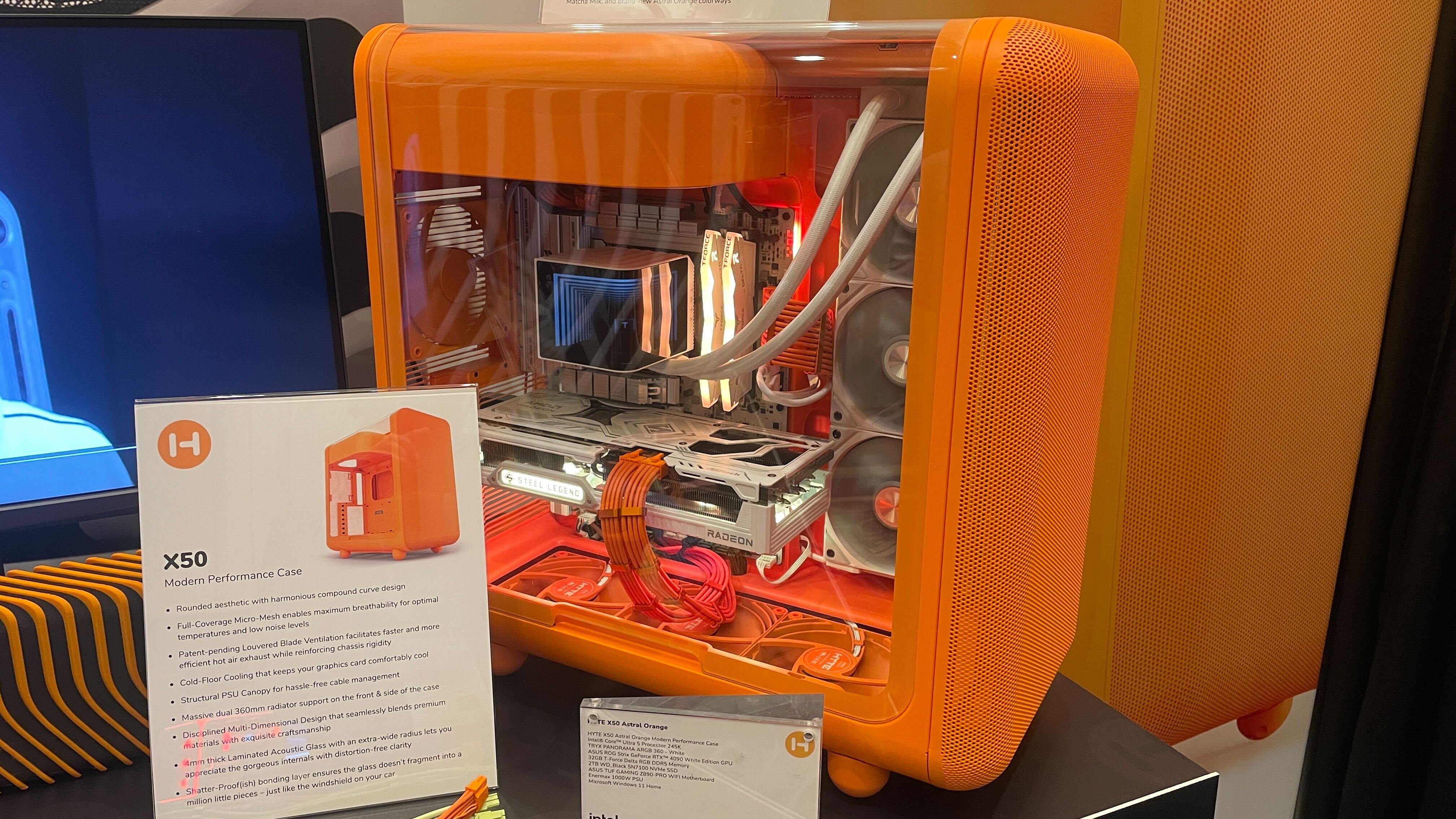 HYTE X50 PC case in Astral Orange on display at CES 2026.