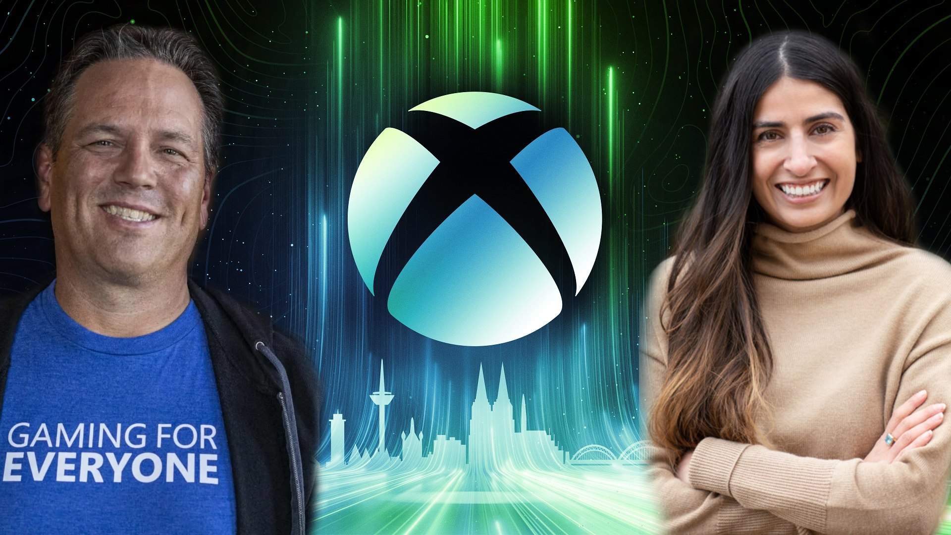 Phil Spencer and Asha Sharma by an Xbox logo