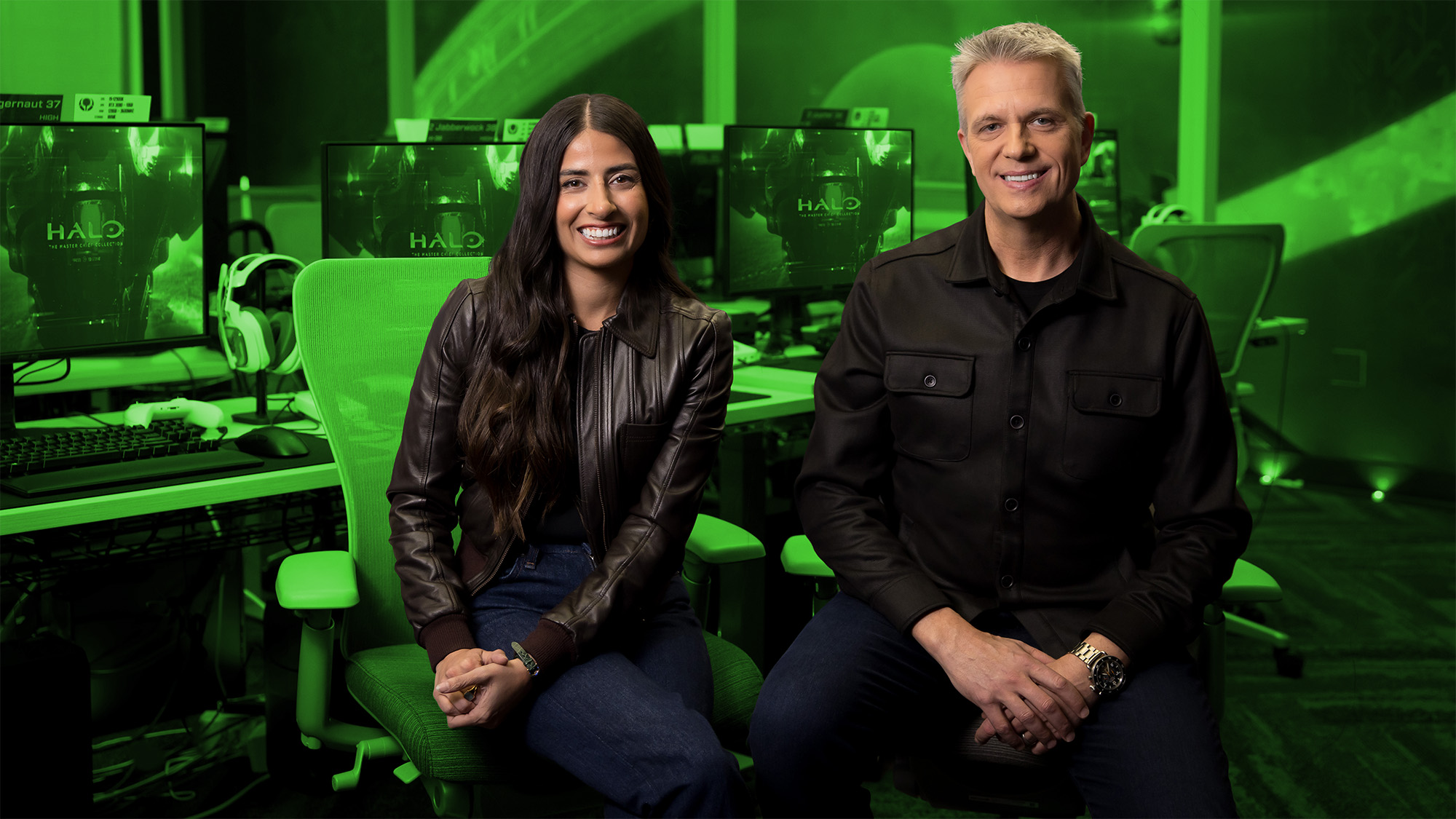 Xbox CEO Asha Sharma and Xbox CCO Matt Booty, on a green background