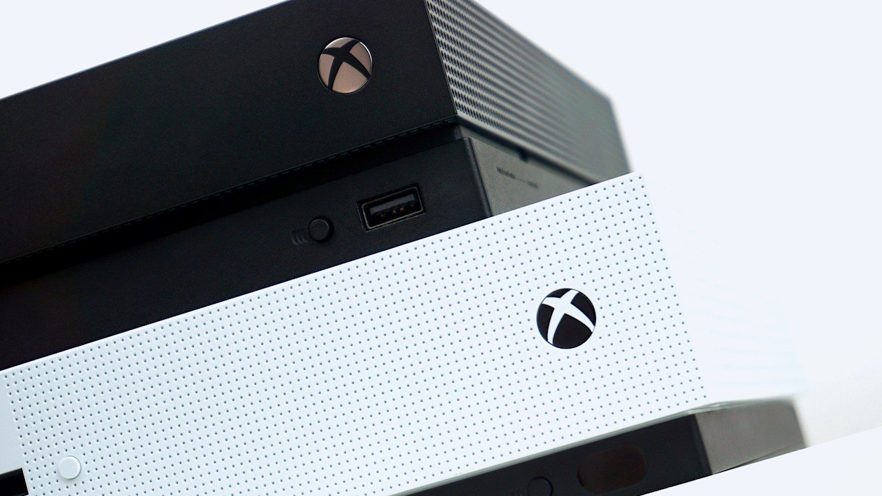 Image of Xbox One X stacked on top of Xbox One S.