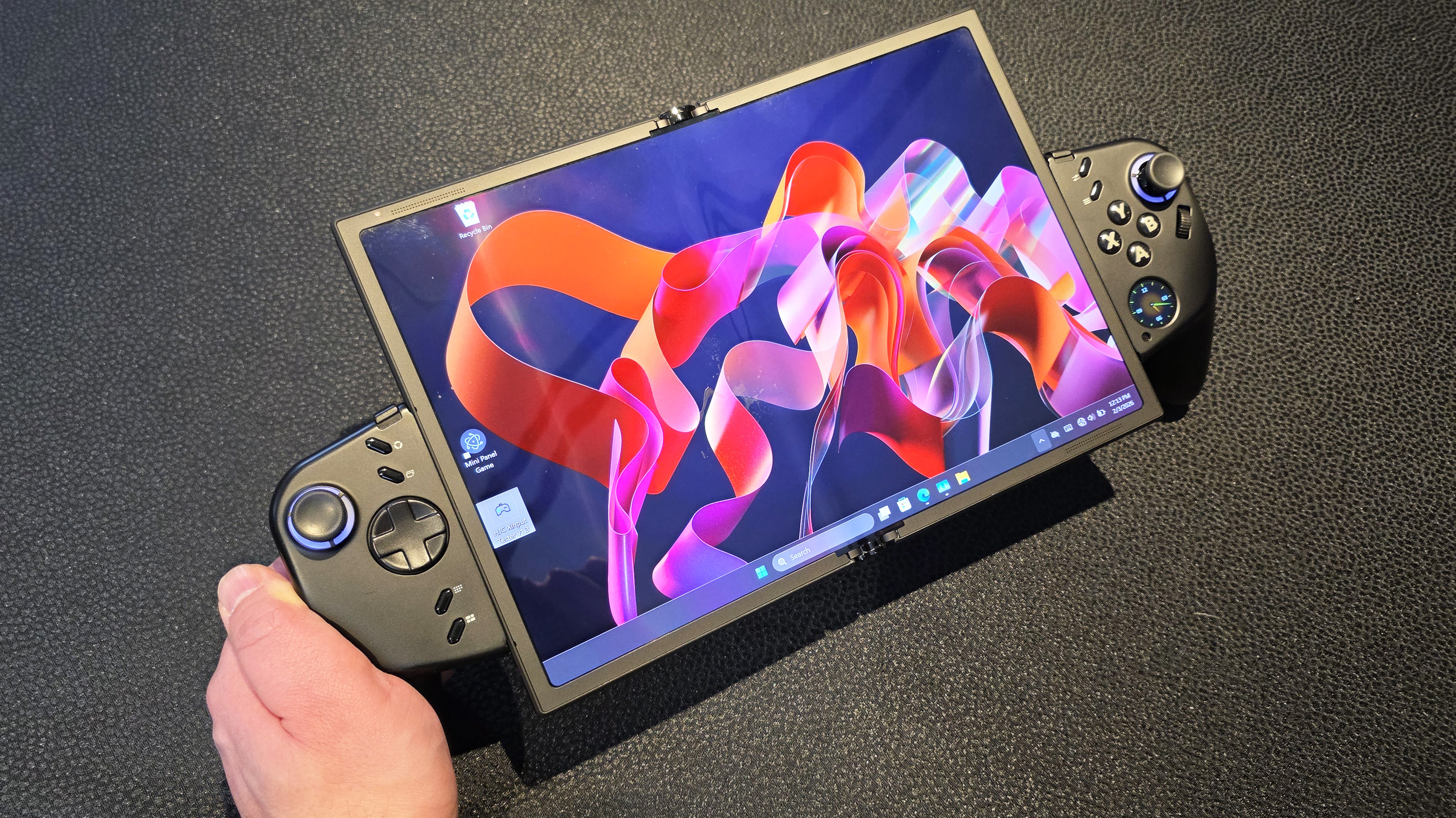 Photos of the concept device from Lenovo called the Legion Go Fold.