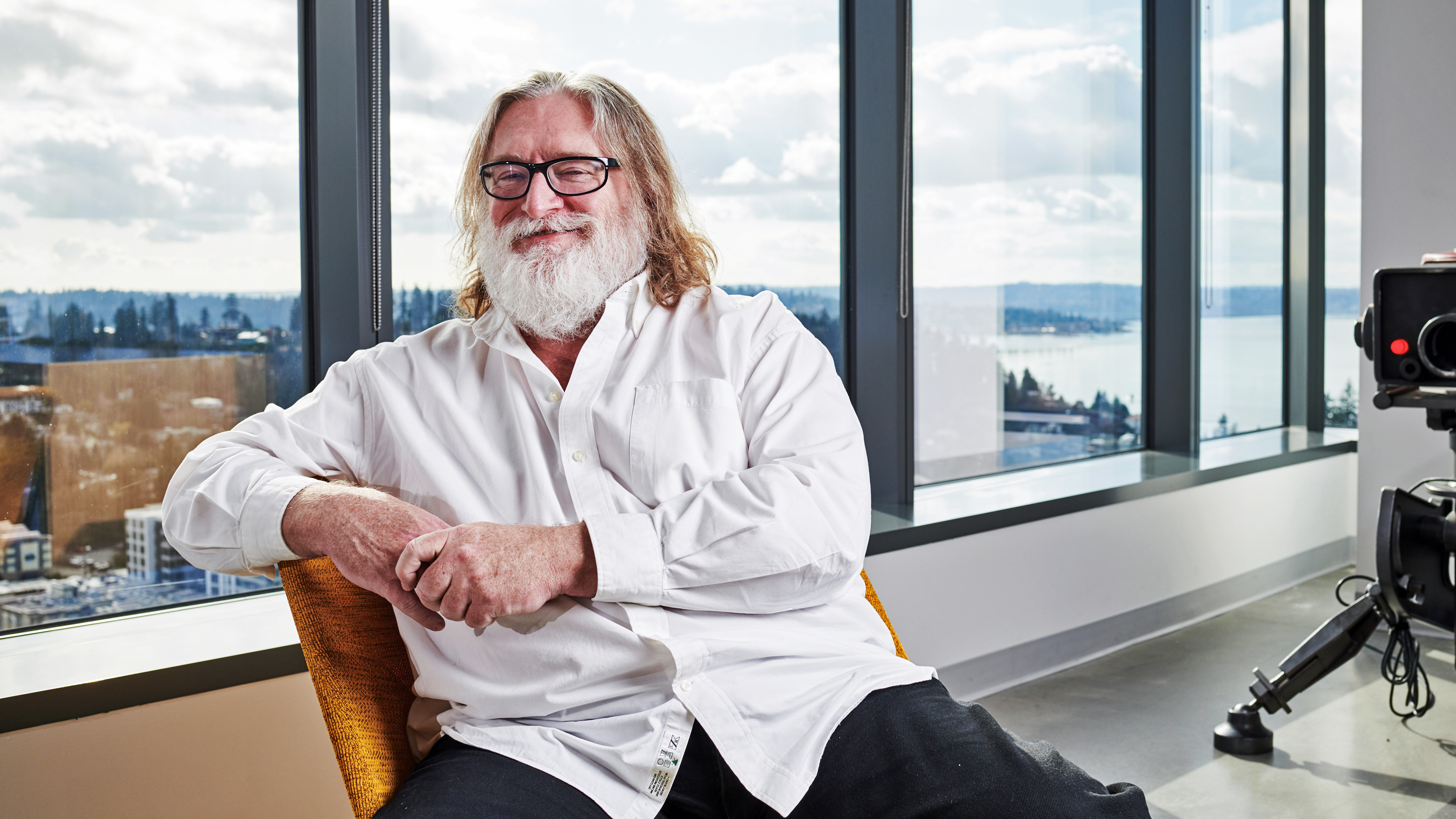 Gabe Newell sitting at Valve's headquarters