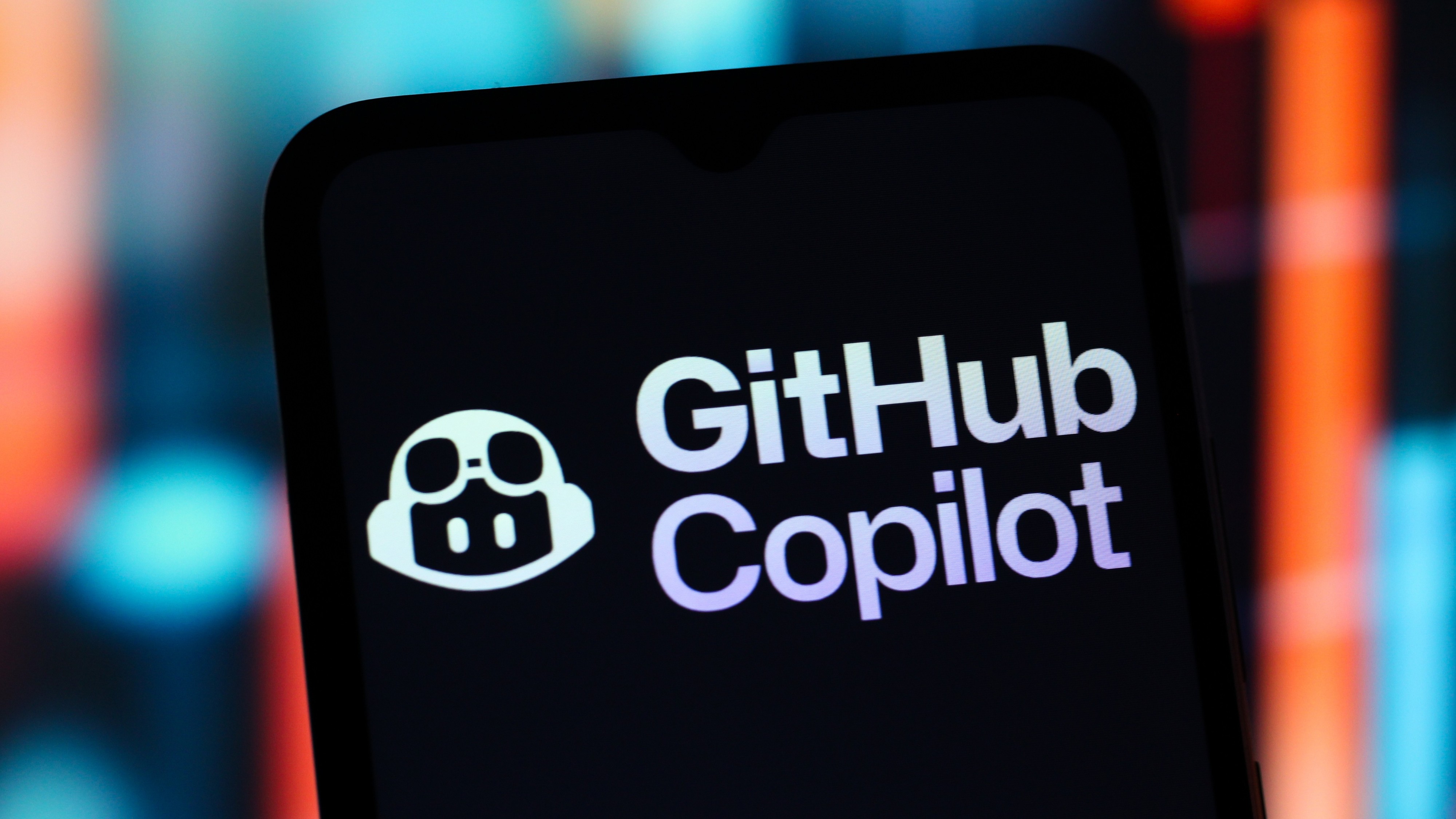 GitHub Copilot logo on a smartphone