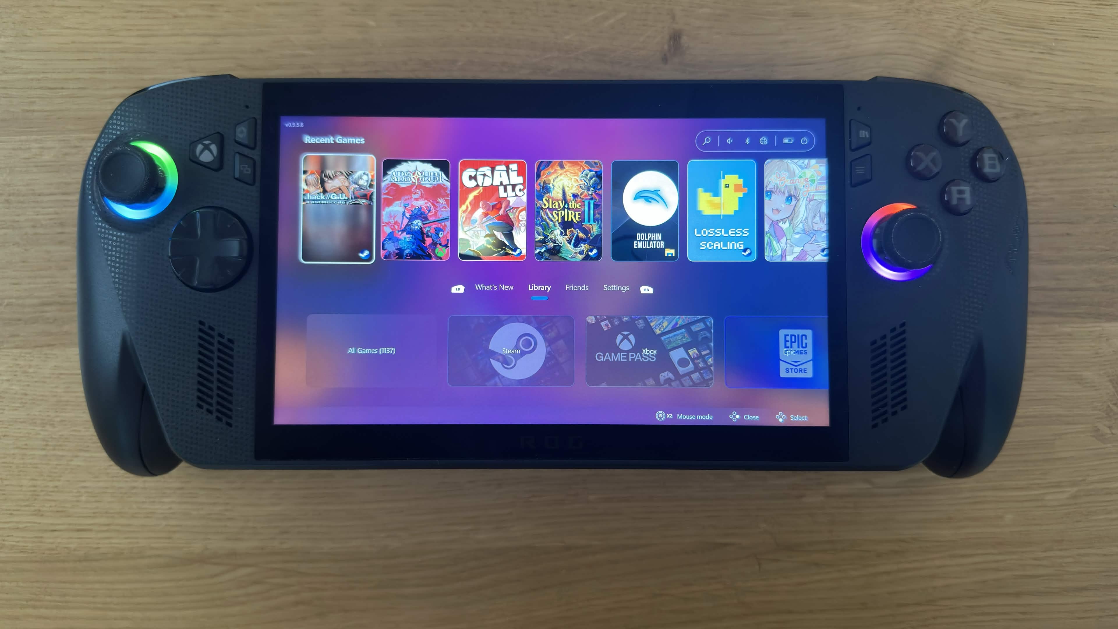 ASUS ROG Ally displaying Winhanced home screen with Steam, Game Pass, and Epic Games integration.