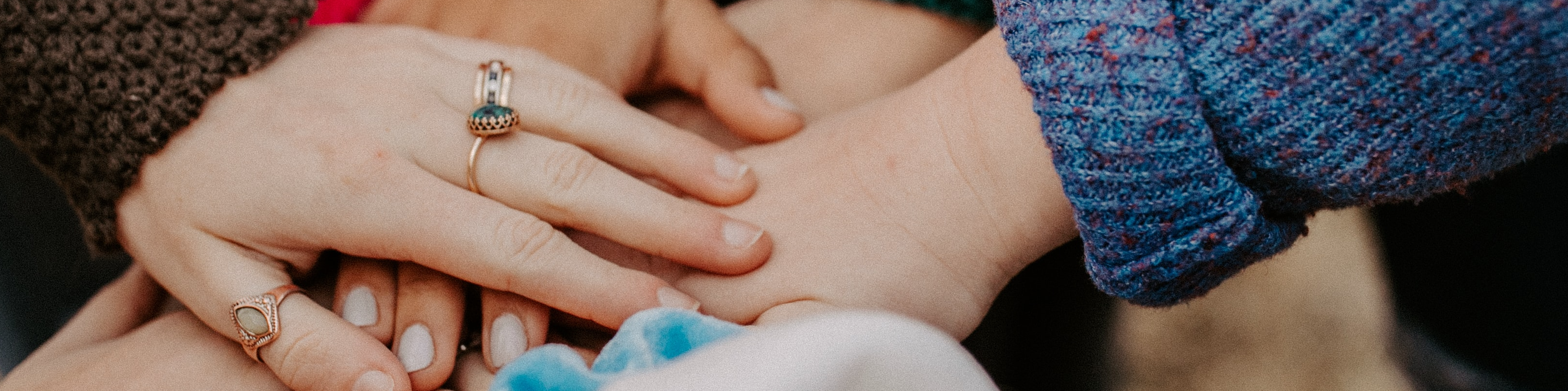 An image of people holding hands 