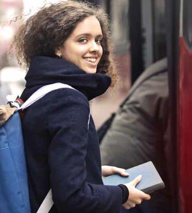 Student getting on bus