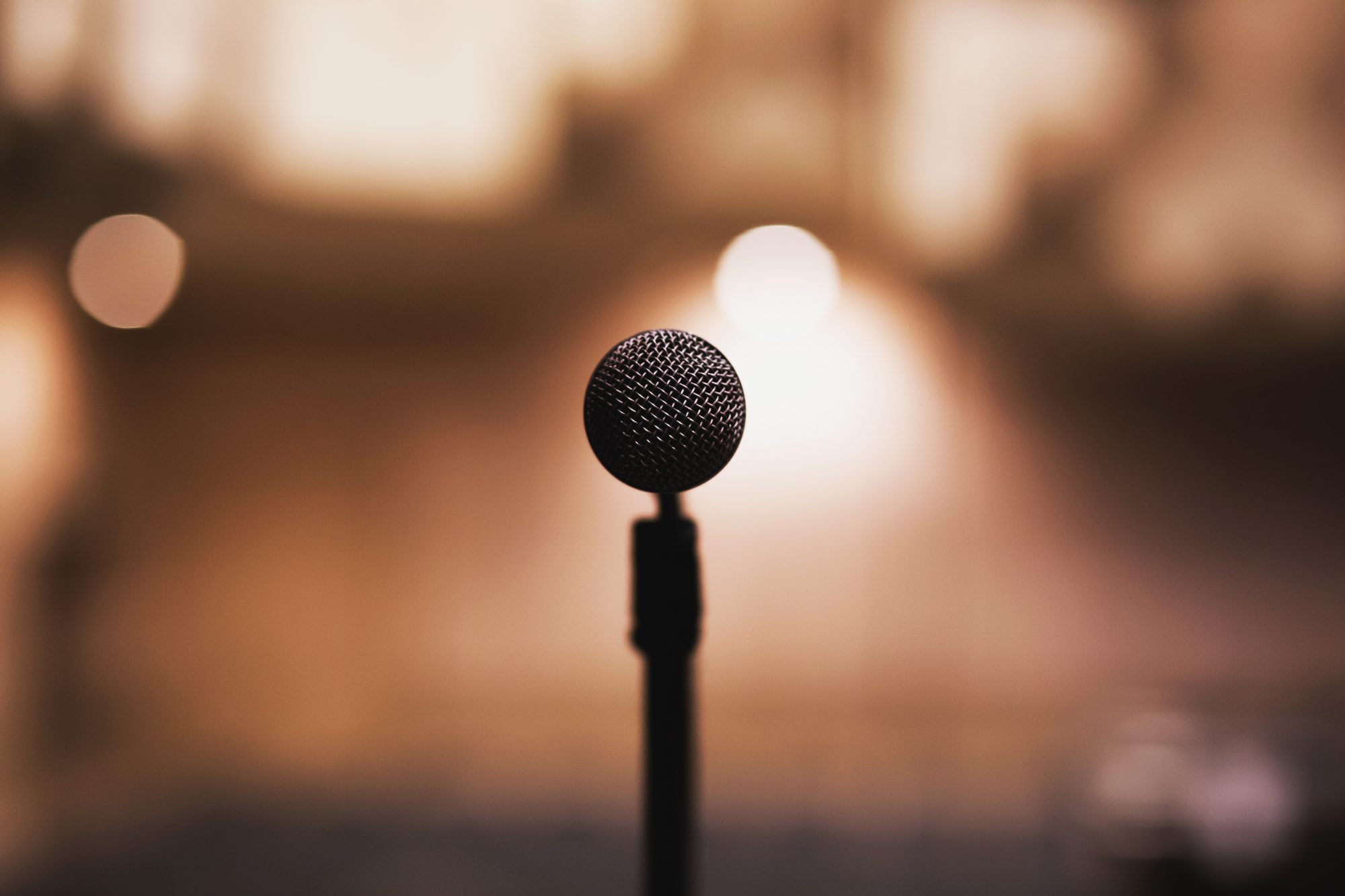 Freestanding black vocal recorder standing on a stage