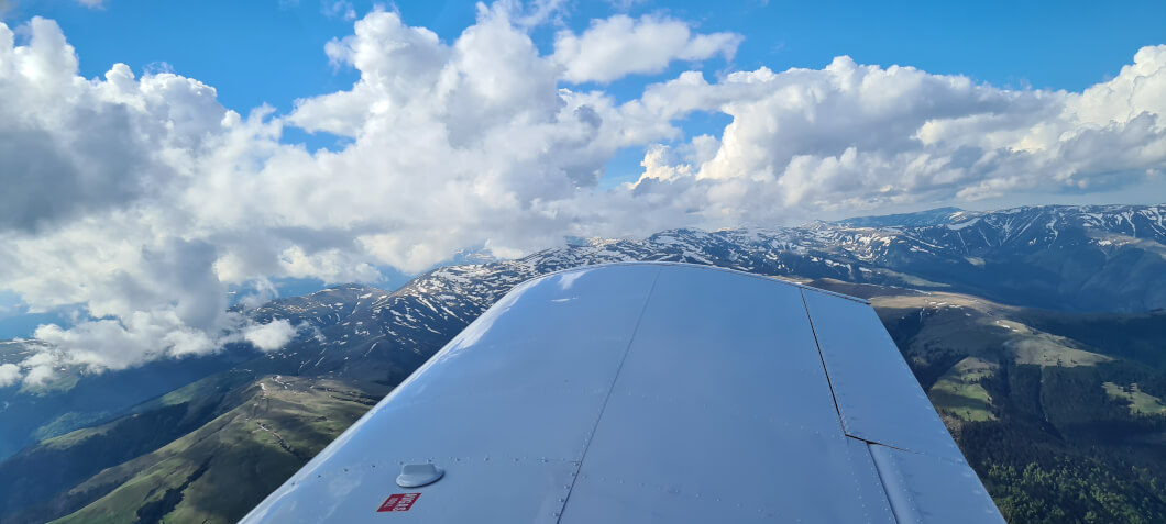 Zbor cu Avionul deasupra Munților Bucegi
