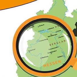 Umzugskarton mit Tasse und Schlüssel