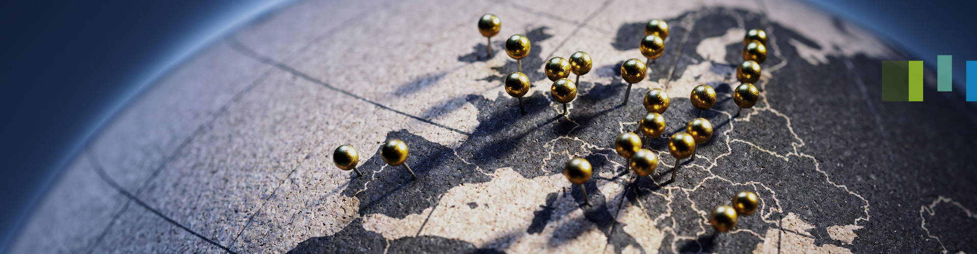 Bild Weltkarte aus Kork mit goldenen Pins für Zoll-Update-Veranstaltung