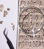 Beschädigtes Notenblatt 