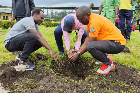 Young people planting a tree in Rwanda (Photo: Deo Ngoga Kalisa for NICE)