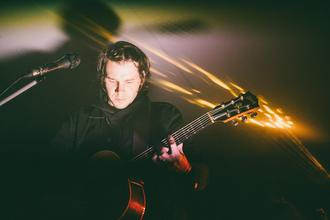 Kalle with the acoustic band