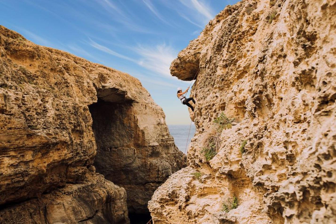 Climbing the cliffs of Gozo