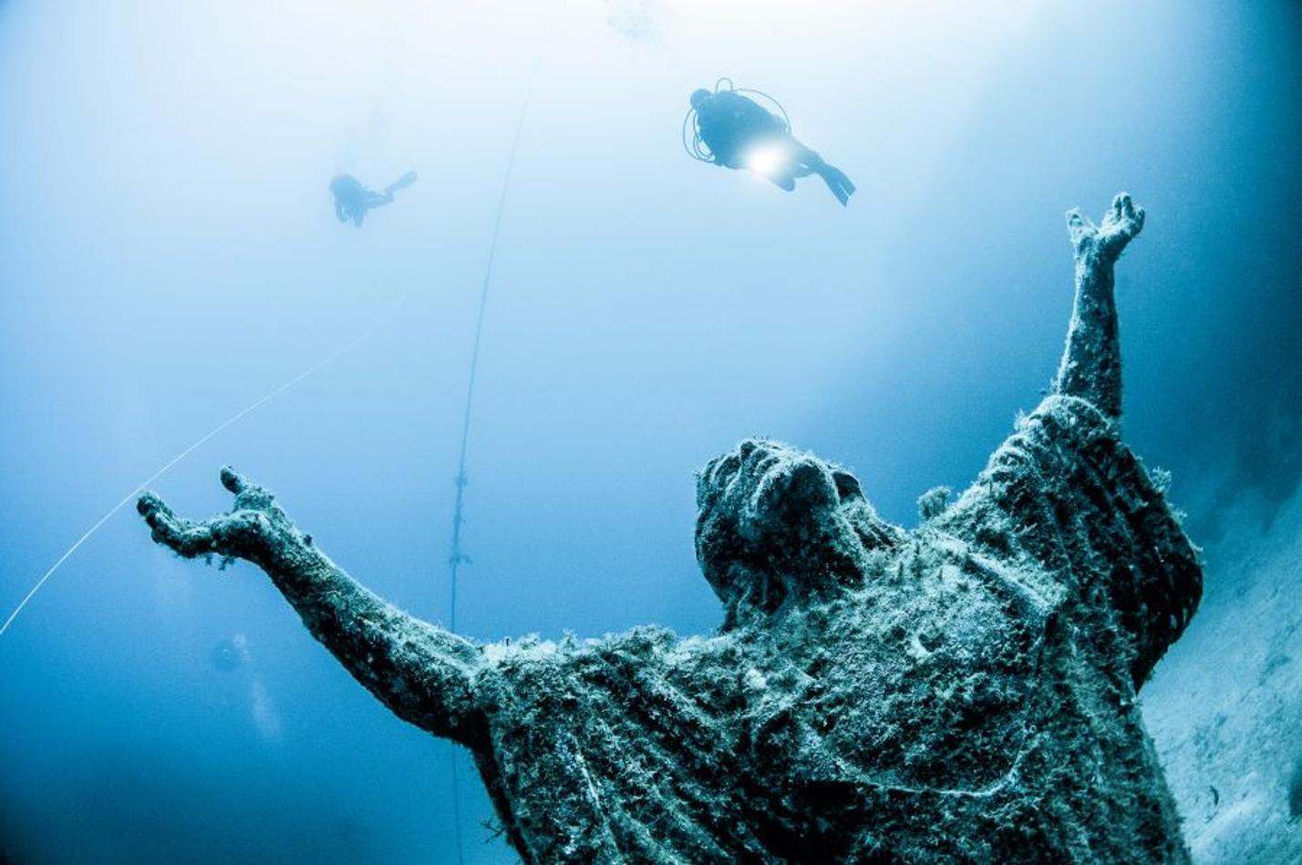 Snorkeling around the Statue of Christ in Qawra