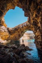 Boat in the caves of Comino