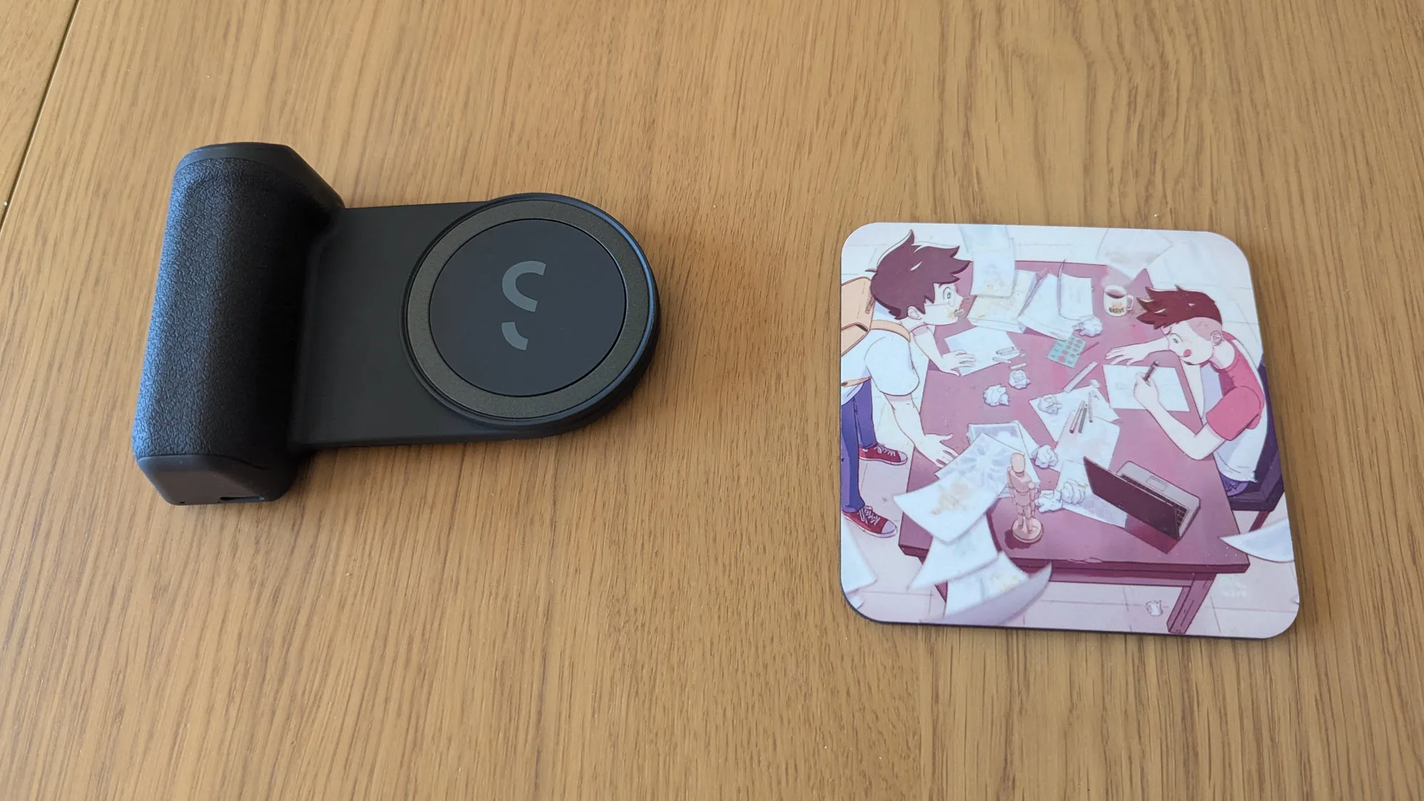SnapGrip ShiftCam beside Geek Native coaster