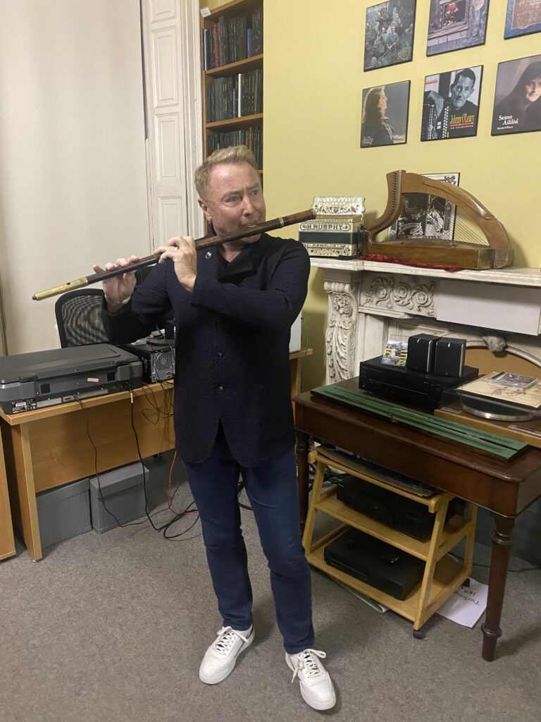 Michael Flatley playing flute in ITMA