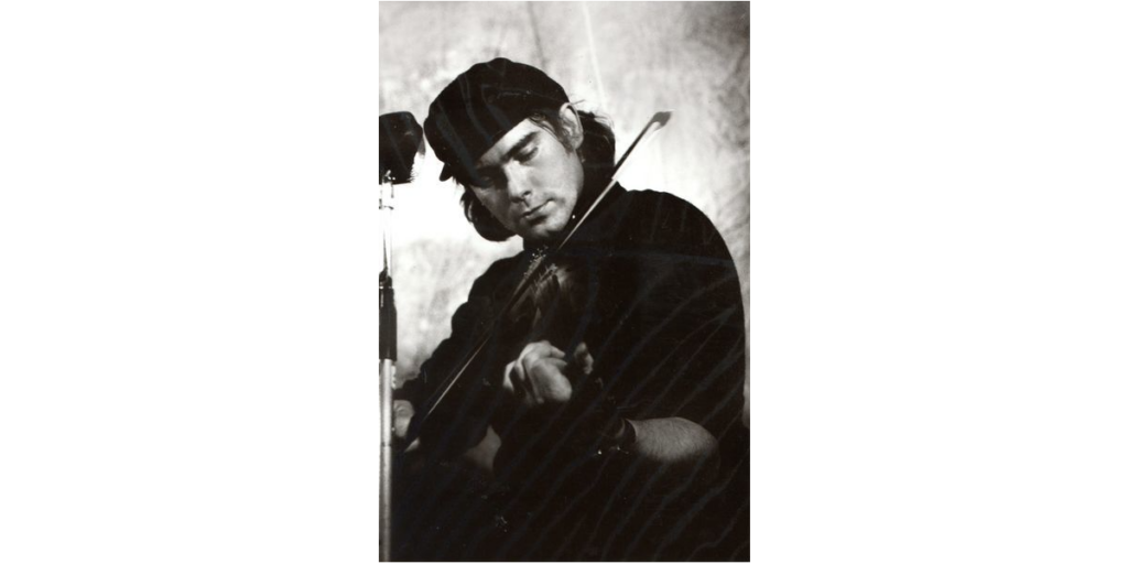 Andy Dickson playing fiddle