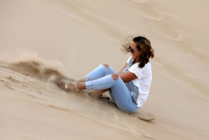 Abu Dhabi: Desert Safari with BBQ, Camel Ride & Sandboarding