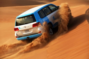 Abu Dhabi: Desert Safari with BBQ, Camel Ride & Sandboarding
