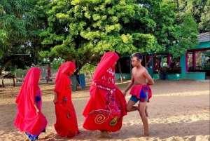 Rosa Flamingos, Ranchería und Sonnenuntergang in Mayapo