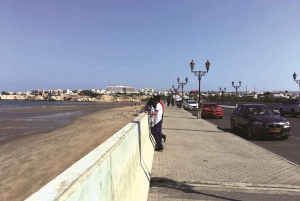 Muscat: Wadi Shab and Bimah Sinkhole Tour with Audio Guide