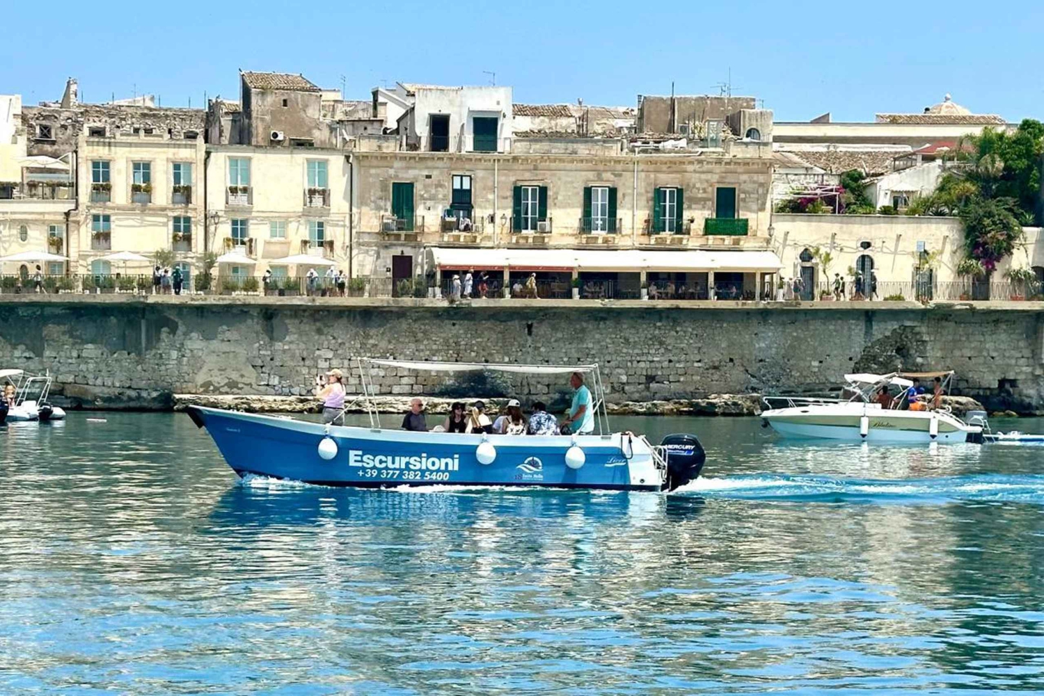 Siracusa: tour in barca dell'isola di Ortigia e delle grotte marine con prosecco