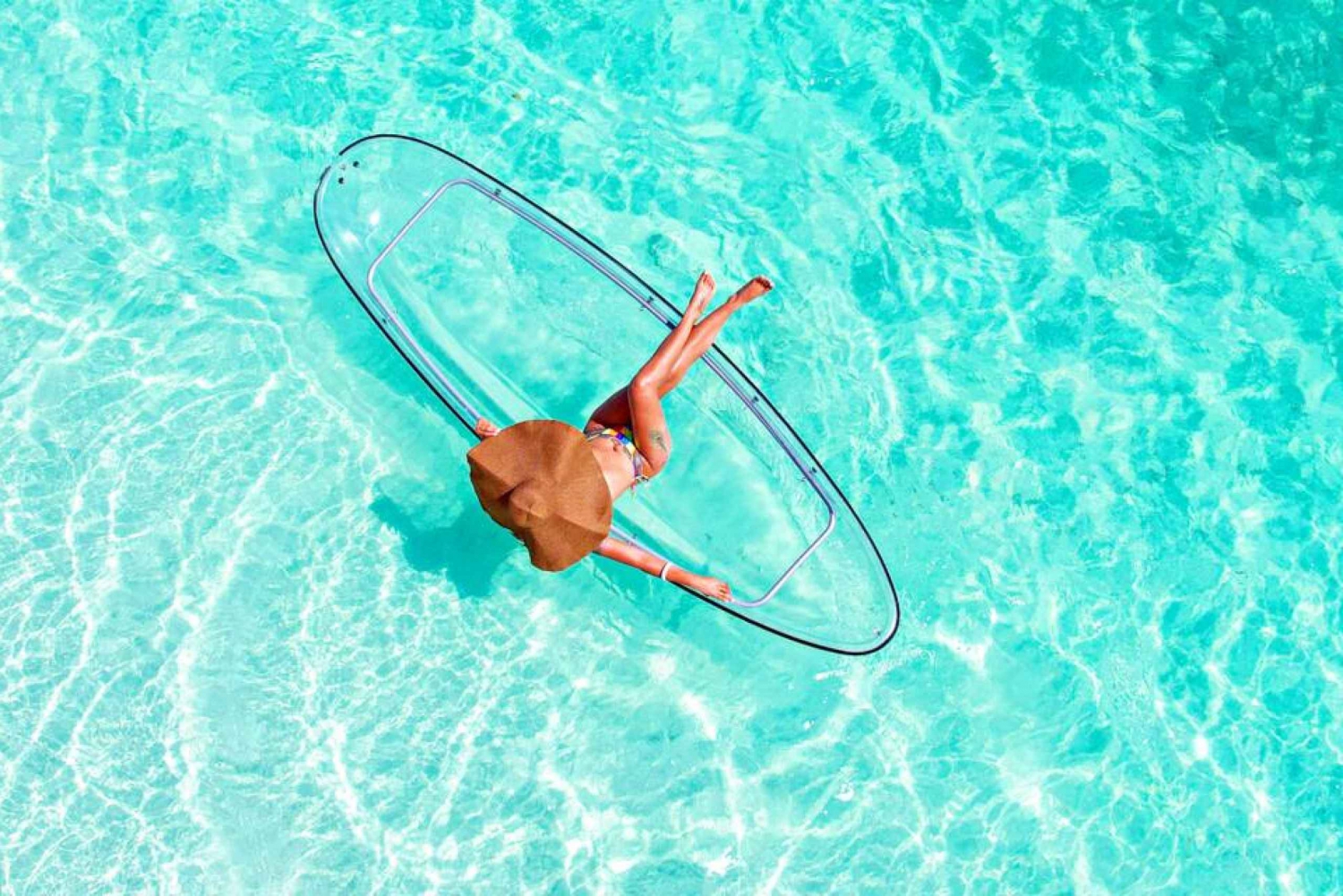 Caiaque transparente em Zanzibar com fotos e vídeos de drone + recolha