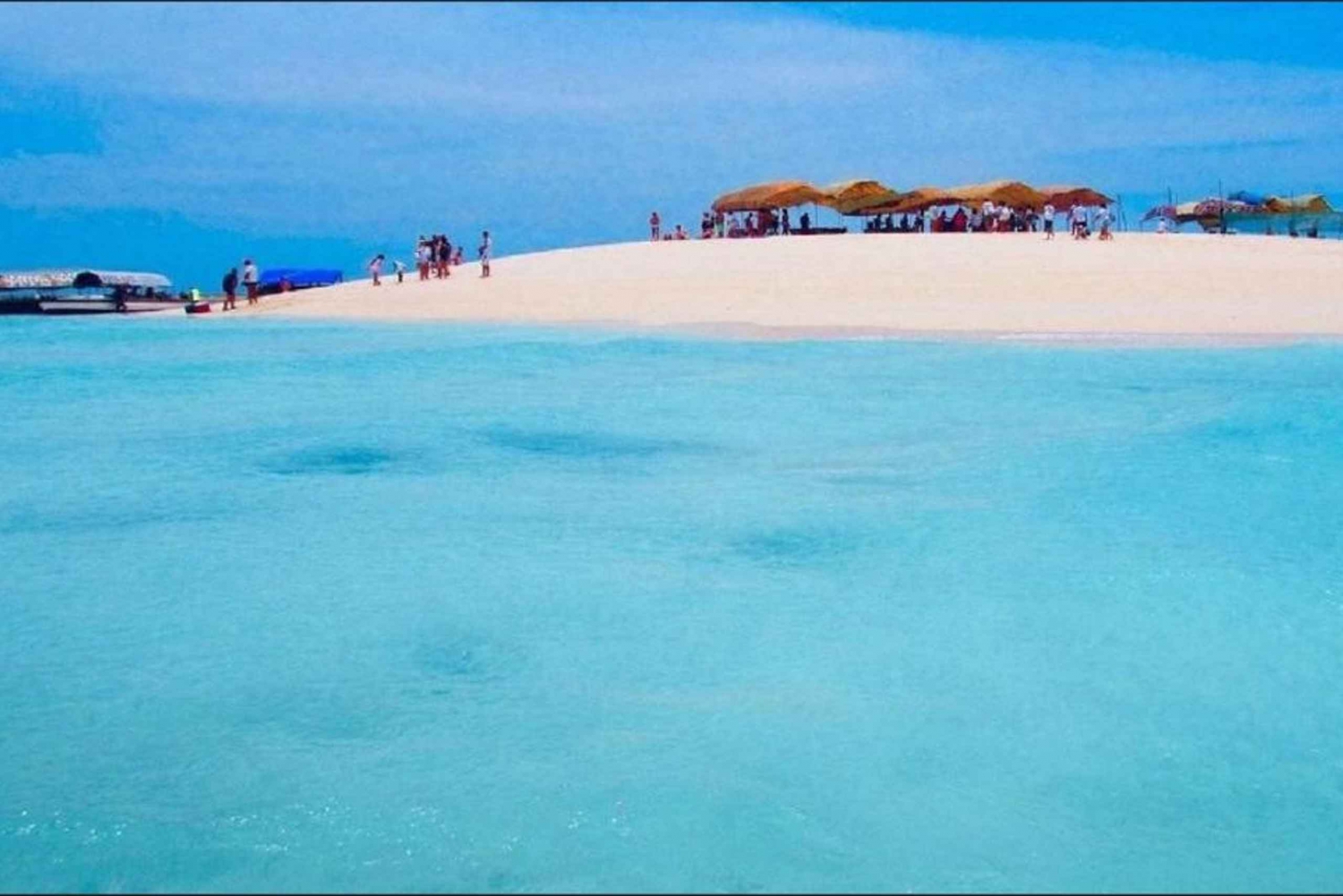 ИЗ НУНГВИ: ПЛАВАНИЕ С МАСКОЙ И ДЕЛЬФИНАМИ В МНЕМБЕ