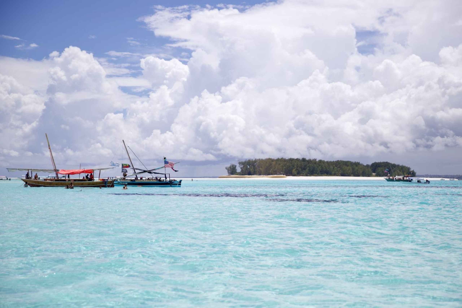 Zanzibar: Mnemba Island Dolphin Watching and Sunset Cruise