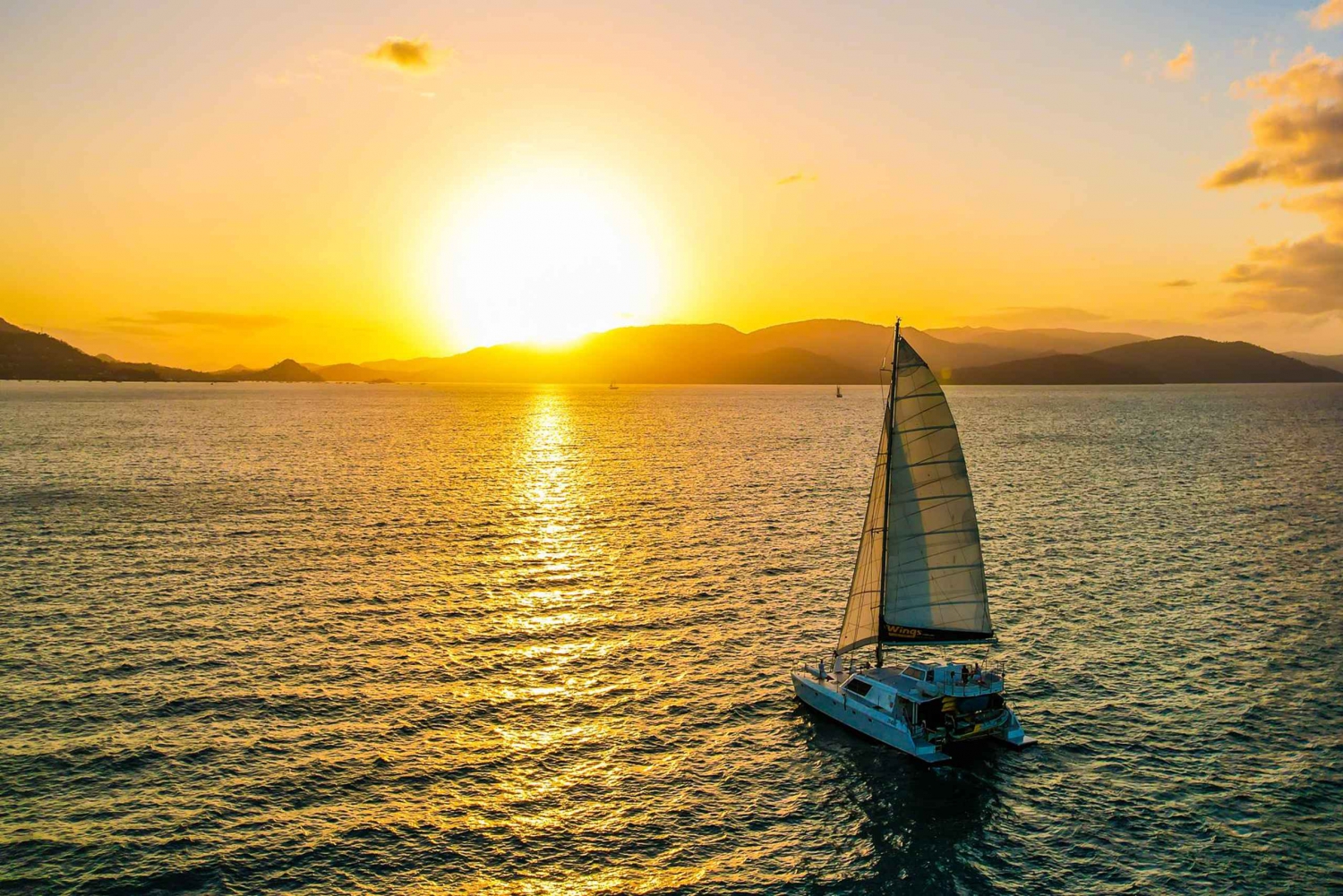 Airlie Beach: BYOB Sunset Sail in Style Catamaran Cruise
